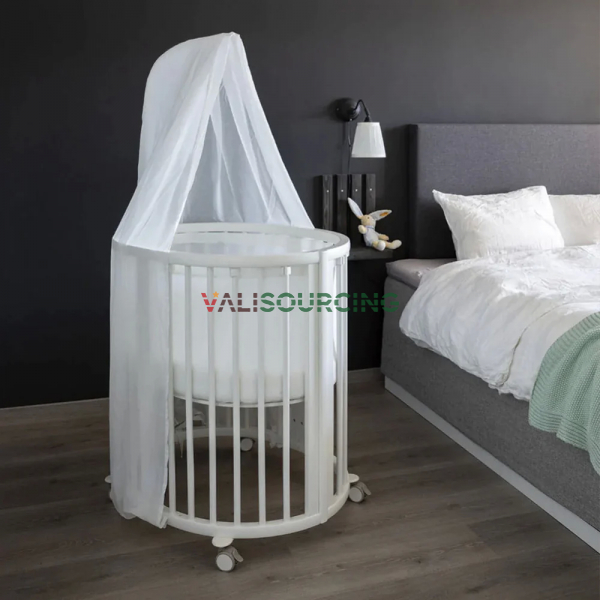 Stokke Sleepi Mini V3 premium crib for babies with swivel wheels and anti-slip lock
