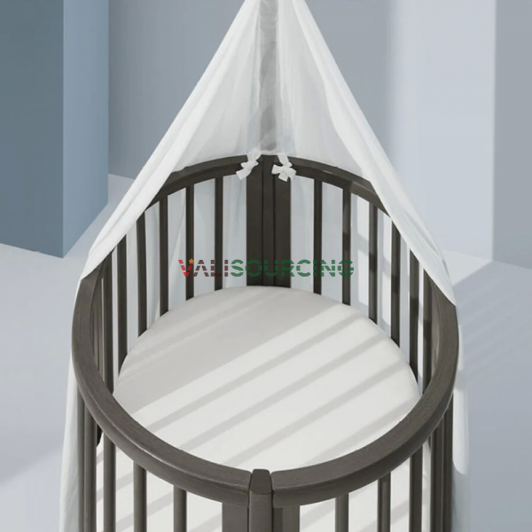 Stokke Sleepi Mini V3 premium crib for babies with swivel wheels and anti-slip lock